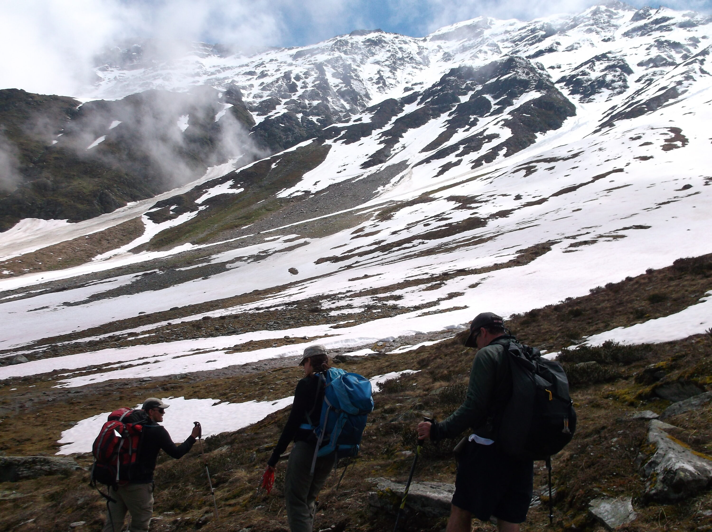 Hikers on snowy trail